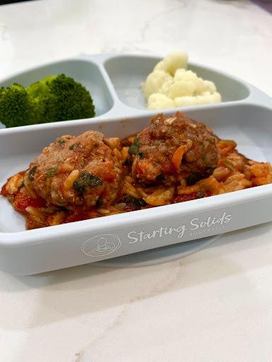 Risoni meatball one tray bake in a Suckie Scoop Divided Plate with cauliflower and broccoli by Starting Solids Australia