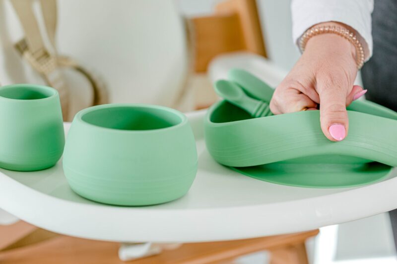 Green silicone baby feeding wares by Starting Solids Australia on Tripp Trapp highchair.