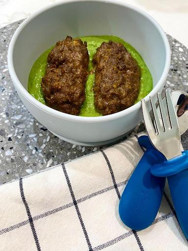 Spinach and Cannelini Bean Puree with Beef Koftas in a bowl with Toddler Silvies by Starting Solids Australia