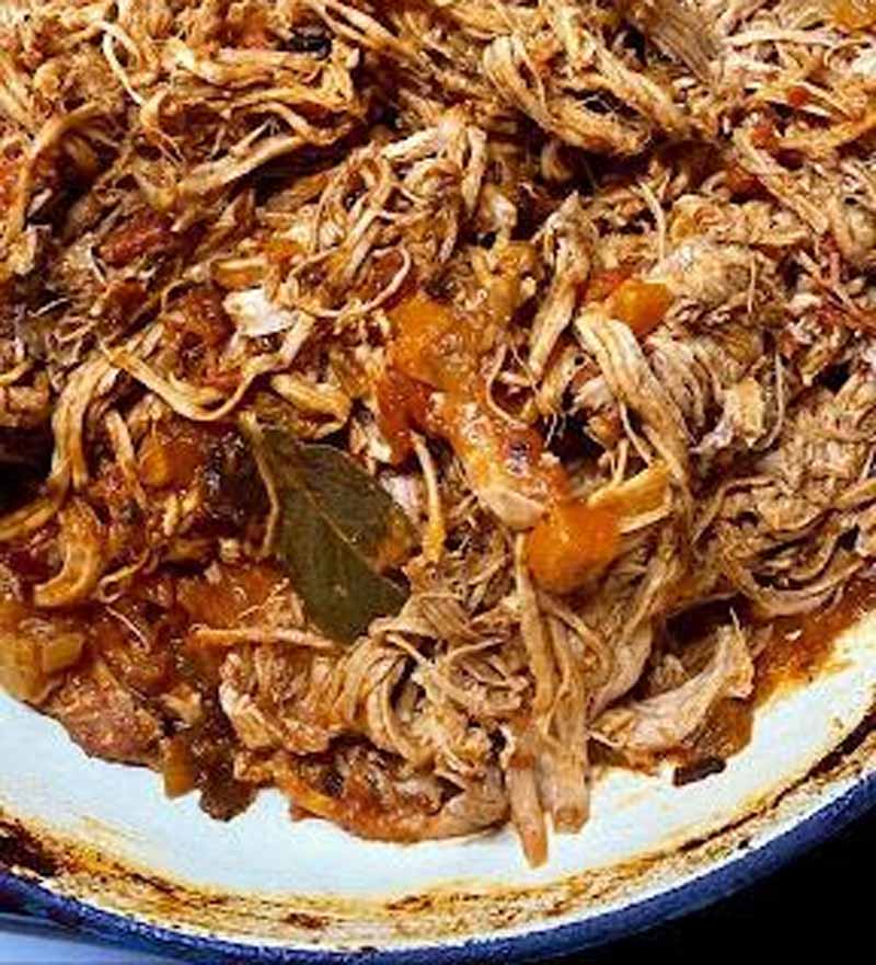 Slow cooked pulled pork dish detail.