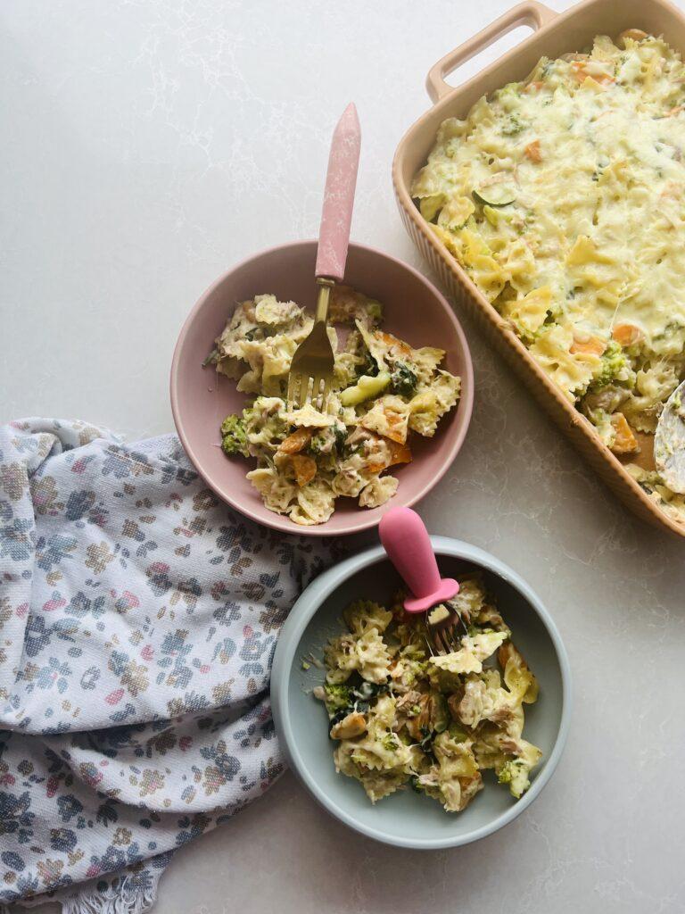 Tuna Alfredo Bake in baking tray and silicone bowl with toddler cutlery by Starting Solids Australia