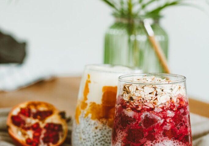 clear drinking glass with red liquid inside